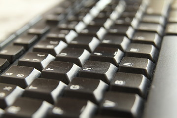 typing on a laptop computer keyboard close up