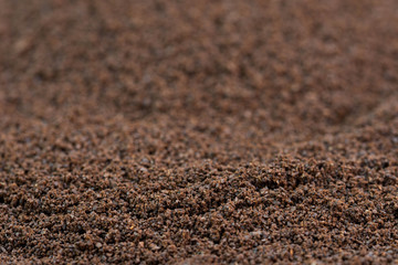 ground coffee background texture selective focus