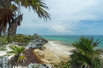 A view of the beach and ocean below the Temple of the Wind God Mayan ruins in Tulum, Quintana Roo, Mexico