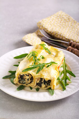 Cheese and spinach filling cannelloni