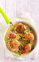 Chicken thighs with peas