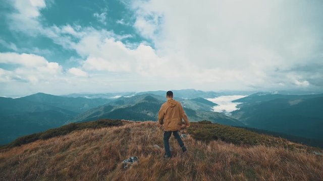 The Man Running On The Picturesque Mountain