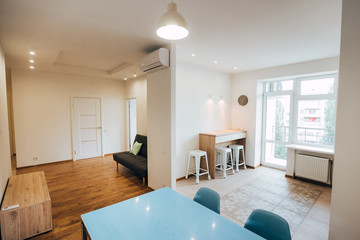 modern light interior. studio apartment. apartment with white walls and ceiling.