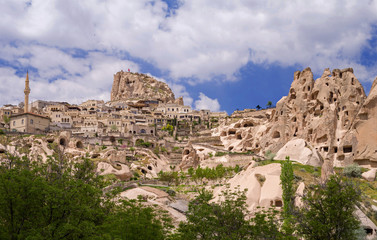 Fototapeta na wymiar View of Uchisar and Uchisar fortress from Pigeon Valley. Cappadocia, Turkey.