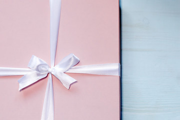 Pink box with white bow, a gift