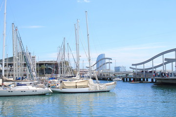 Fototapeta na wymiar Sail boat in Marina Port Vell, a waterfront harbor in Barcelona, Catalonia, Spain