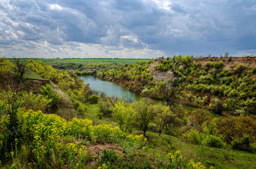 Obraz premium Industrial landscape. A lake in an abandoned quarry.