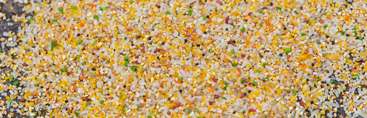 Fundo com grãos triturados para comida de pássaros