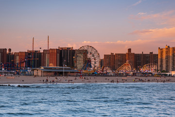 Sunset on the beach of Luna Park in Coney Island New York City