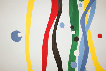 An image of colored wavy vertical lines on a gray background.