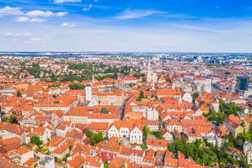 Fototapeta na wymiar Panoramic view on Upper town and st Mark church in Zagreb, red roofs and palaces of old baroque center, political center of Croatia