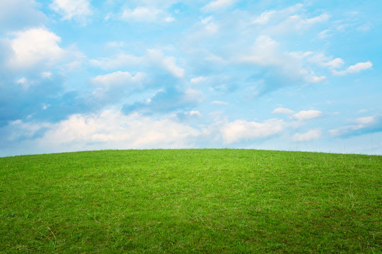 Beautiful simple hill landscape with clouds background