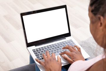 Close-up Of Businesswoman Working On Laptop