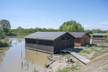 wooden warehouses on Nicesolo canal, Sindacale, Portogruaro, Italy