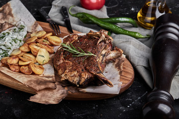 Grain fed Grilled Tomahawk Beef steak with fried potato wedge