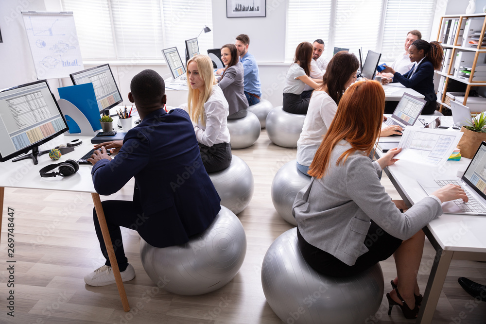 Poster group of businesspeople discussing while working in office