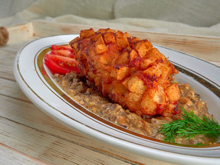 Delicious fried Patty of chicken meat, Pozharskaya.With creamy mushroom sauce.Fresh vegetable salad.Fried toast.