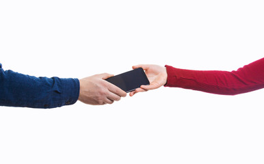 Man hand giving woman mobile phone present