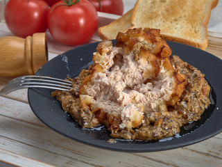 Delicious fried Patty of chicken meat, Pozharskaya.With creamy mushroom sauce.Fresh vegetable salad.Fried toast.