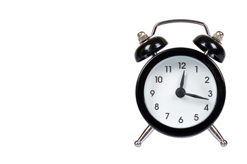 Black retro alarm clock, classic watches with bells.
