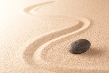 Sand and stone texture background with line pattern. Minimal zen meditation garden. Concept for yoga, spa wellness or buddhism and mindfulness.  With copy space..