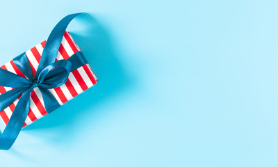 4th of July American Independence Day. Gift box in national colors red, blue and white. Happy...