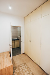 modern light interior. room with white walls and wooden floor.