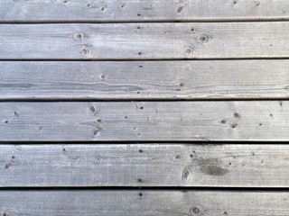 Old wooden uneven texture pattern useful as background.