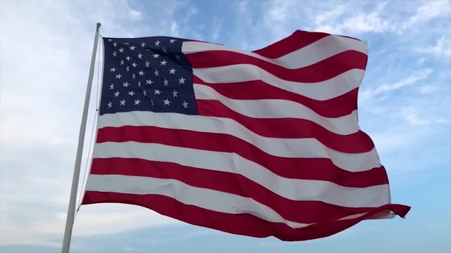 United States of America flag waving in the wind. (slow motion)