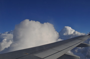 Naklejka na ściany i meble The beautiful view from airplane window sky and cloud
