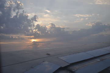Fototapeta na wymiar The beautiful view from airplane window sky and cloud