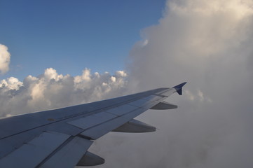 Fototapeta na wymiar The beautiful view from airplane window sky and cloud