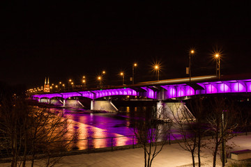 Fototapeta na wymiar lit bridge at night