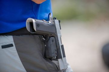 armed man on the shooter range