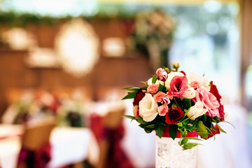 bouquet of flowers with roses, peonies, carnations. delicate bouquet in pink colors. eucalyptus leaves.