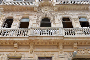 View of typical architecture and colonial buildings in Havana on a sunny day, Cuba