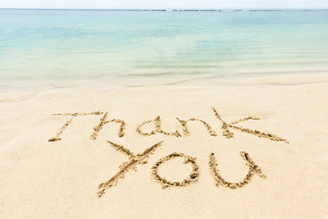 Thank You Word Written On The Sand At Beach