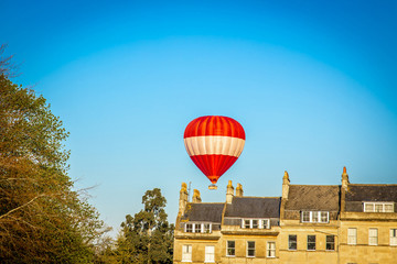 Hot air baloon ride above th city of Bath in England