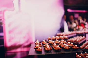 Small tartlets sweet cakes at a party