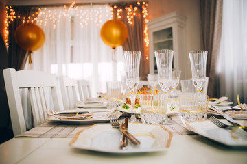 empty crystal  glasses on house celebrate dinner table