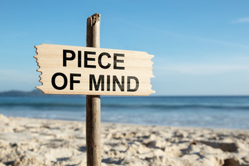 Piece Of Mind Wooden Pole On The Sandy Beach