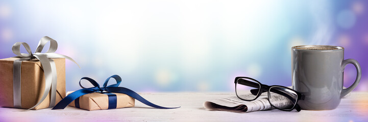  Gifts On Table  With Newspapers Reading Glasses And Coffee - Fathers Day Concept