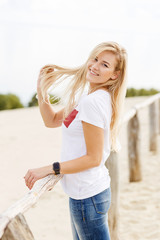 beautiful blonde on a sandy slope