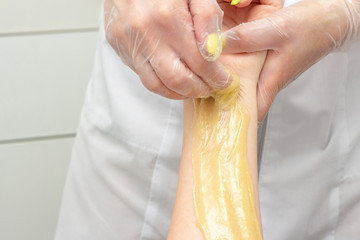 sugar depilation shugaring hands make a girl in spa center
