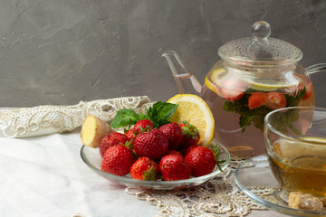 Hot lemon, ginger, mint and strawberry tea