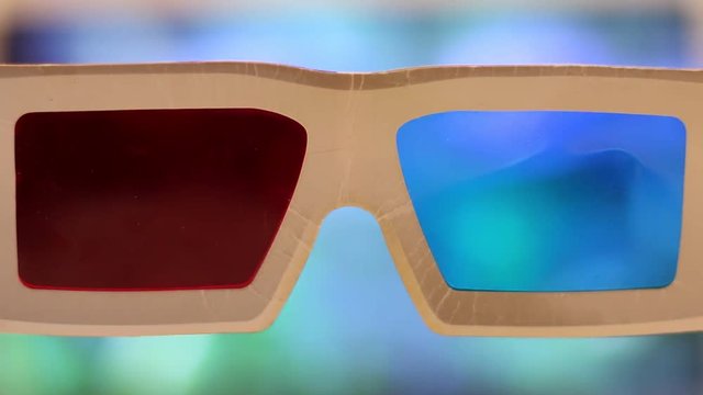 3d stereo glasses with movie on background