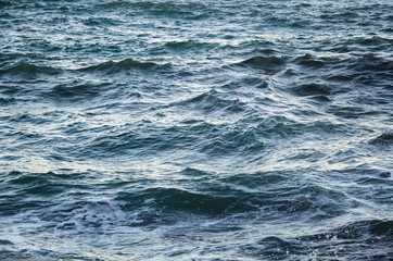 Seascape background of storm, white marine foam