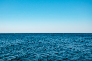 Fototapeta na wymiar Seascape, view of sea horizon and blue sky