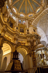 Fototapeta na wymiar Chancel rotunda ceiling dome with tabernacle in the Granada Cathedral of the Incarnation