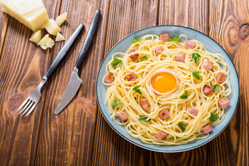 Itslian pasta carbonara with sausage and egg